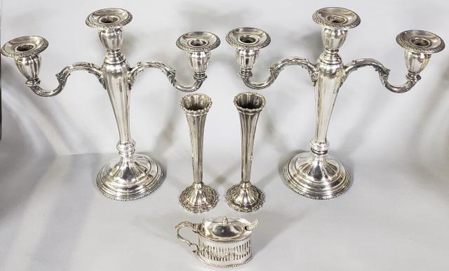 5 PIECES OF SILVERPLATE: Pair of candelabra, approximate height 12", together with pair of vases, and a jelly jar, with cobalt insert and spoon.