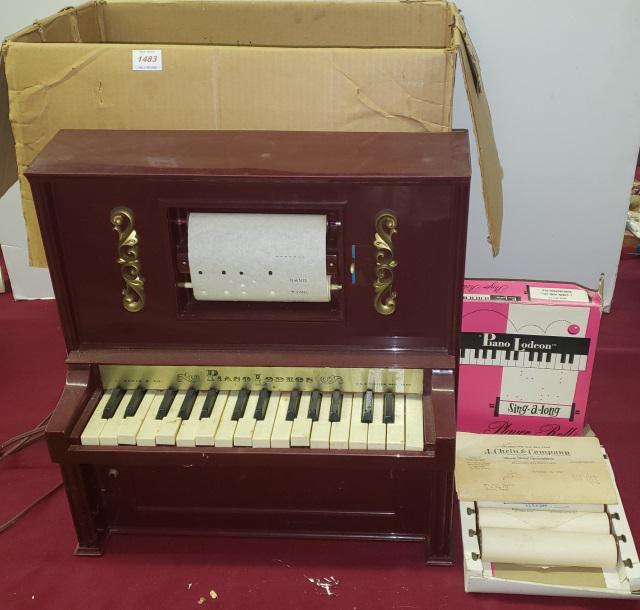 *TOY PIANO: Piano Lodeon, No. 909, electrically operated, with player rolls, with original box.
