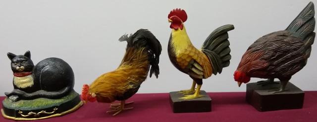 4 PIECES: 3 roosters and figural doorstop of cat.