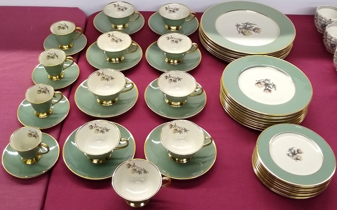*SET OF FLINTRIDGE DINNERWARE: 7 dinner plates, 9 salad plates, 9 bread plates, 9 coffee cups, with 8 saucers, and 5 demitasse cups, with 5 saucers.
