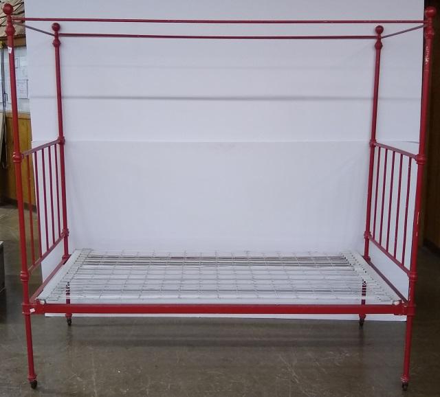 *IRON BEDSTEAD: With painted red finish, interior size (mattress)74" x 37"+, exterior size 78" x 37", height 76".