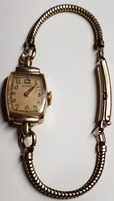 LADIES' HAMILTON YELLOW GOLD FILLED WATCH: Approximately 6.9 DWT.