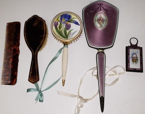 *5 PIECES OF DRESSER ACCESSORIES: Tortoise shell style brush, faux ivory handled brush, enameled decorated hand mirror, etc.
