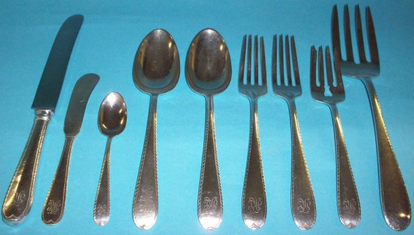 ***FIFTY-TWO PIECE SET OF ENGLISH STERLING SILVE: Bearing 1830 Birmingham hallmark, "Old English" pattern, comprising 8 dinner knives, 8 dinner forks, 6 salad forks, 8 butter spreaders, 6 teaspoons, 7 demitasse spoons, 8 table spoons, and meat fork.