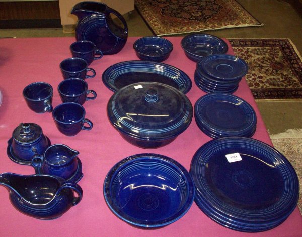 ***GROUP OF FIESTA DINNERWARE: Four dinner plates, approximate diameter 10 1/2", four 7 1/2" bread plates, medium 6 7/8" bowl, small 5 1/2" bowl, large 8 1/2" bowl, seven 5 7/8" saucers, five cups, large disc pitcher, height 7", co
