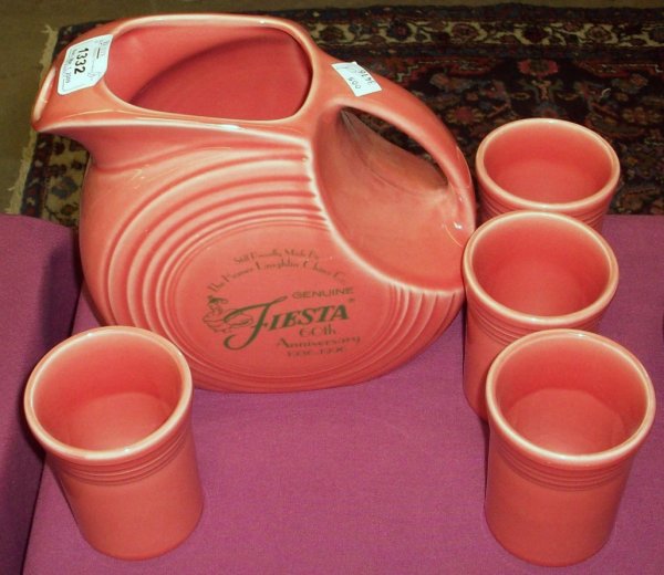 ***FIVE PIECES OF FIESTA WARE: 60th Anniversary large disc pitcher, approximate height 7", and 4 tumblers, height 3 3/4".