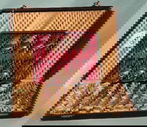 TWO GROUPS| 6 Silverplate Apostle spoons enclosed: TWO GROUPS| 6 Silverplate Apostle spoons enclosed in fitted case and set of 12 butter knives having floral motif. CONDITION: Tarnished, cases as found.