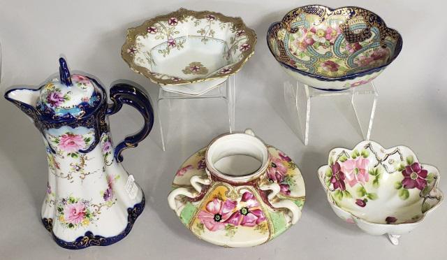 *5 PIECES OF NIPPON PORCELAIN: 3-footed bowl marked Nippon, other pieces (4 bowls and 1 chocolate pot) unmarked, all having floral decoration, pot approximate height 9 1/2".