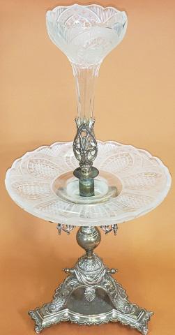 *VICTORIAN EPERGNE: Having single glass vase raised on silverplate stand, circular glass tray in center, base having 3 legs and decorated with draped robe, approximate height 21 1/2".