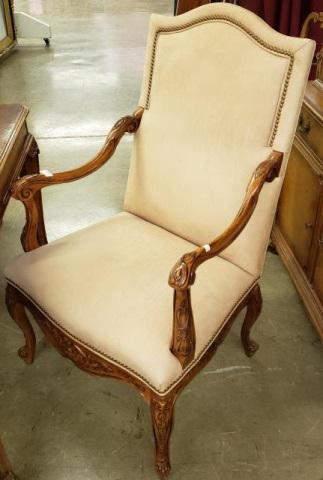 *FRENCH STYLE HIGHBACK ARMCHAIR: By Hancock & Moore, with light brown upholstery.