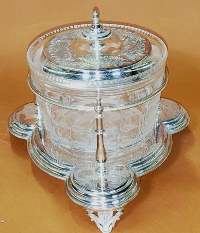 *ENGLISH SILVERPLATE AND GLASS STAND: English cut and etched glass bowl in fitted silverplate stand with silverplate lid, approximate height 5 1/2".