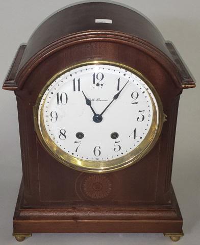 *SETH THOMAS MANTEL CLOCK: Porcelain dial with time and strike movement, Arabic numeral markers, walnut case, pendulum and key, approximate height 13 1/8", width 10 1/4", depth 6 1/2".