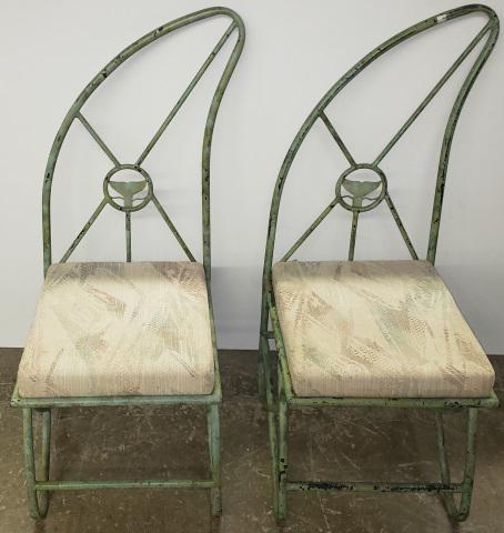 *6 ROBERT WYLAND FIN BACK CHAIRS: Bronze and feature a large dorsal fin back with a smaller tail fin with the Wyland signature, light green in color, with original cushions, approximate height 44 1/2".