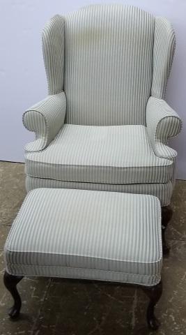*2 PIECES: Queen Anne style wingback armchair having green and white striped upholstery, approximate height 43", width 32", depth 35", together with matching ottoman.