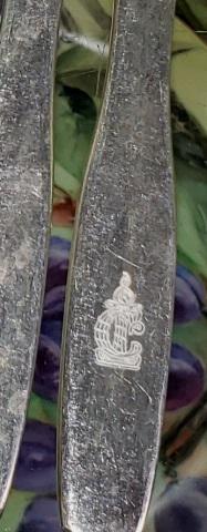 *SET OF ONEIDA SILVERPLATE FLATWARE: Marked Oneida Silversmiths, 24 dinner forks, 12 iced tea spoons, 12 soup spoons, 12 table spoons, 12 teaspoons, 12 pickle forks, 11 dinner knives, along with 12 serving spoons marked Victor S, Co., mo