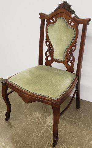 FRENCH STYLE SIDE CHAIR: Having green upholstered back and seat, and carved mahogany frame, approximate height 35 1/4".