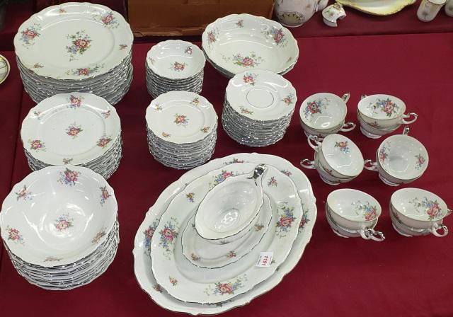 *SET OF BAVARIAN DINNERWARE: Having floral decoration, 12 dinner plates 10 1/4", 12 soup bowls 7 1/2, 12 salad plates 7 3/4", 12 bread plates 5 1/2", 12 fruit bowls, 12 cups with 12 saucers, sauce boat with under plate, 2 oval bo
