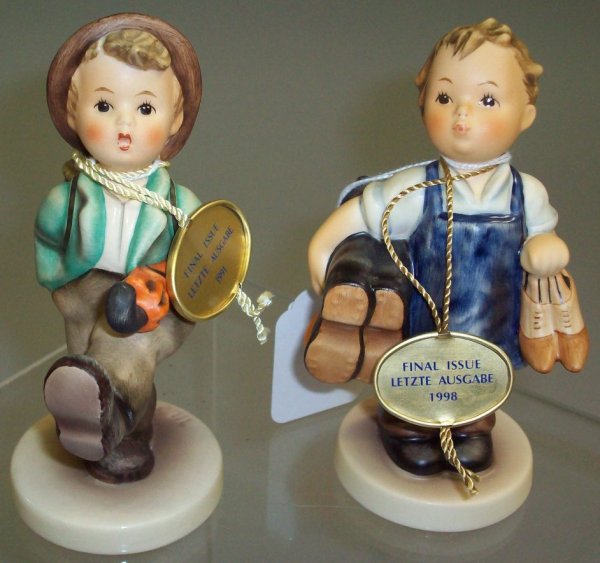 ***TWO HUMMEL FIGURES: "Globe Trotter" #79, approximate height 5 1/4" and "Boots" #143/0, height 5".