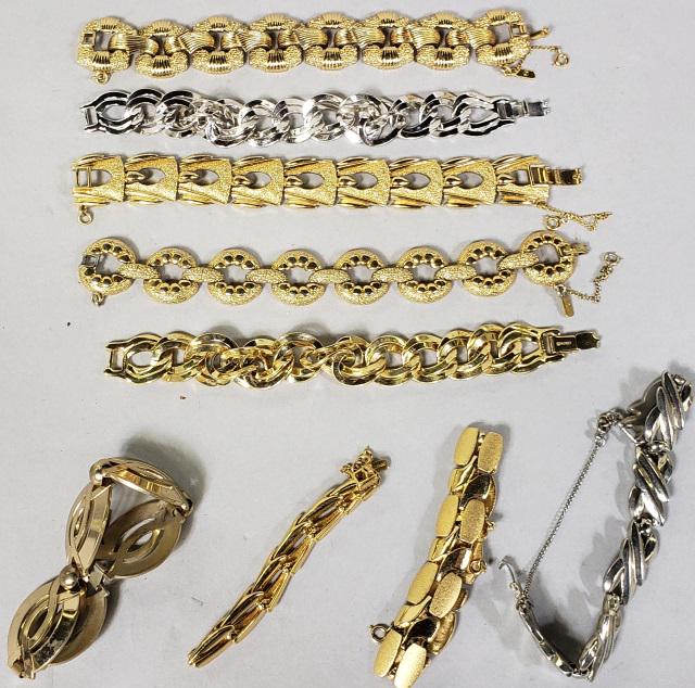 *9 MONET BRACELETS: Gold and silver bracelets.