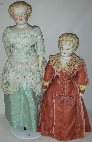 *2 DOLLS: A bisque head doll with molded blonde hair and painted features, with cloth body with bisque arms and leg with painted on boots, approximate height 25", and a china head doll with blonde hair, painted