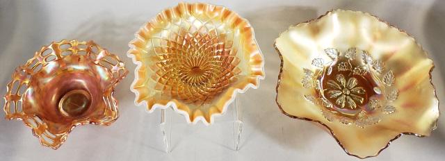 3 PIECES CARNIVAL GLASS: 3 pieces carnival glass, comprising one 3 footed bowl with "Open Edge Basket" pattern, approximate diameter 6 3/4", one footed bowl with "Diamond Point" pattern approximate diameter 6 1/2" and a bowl 