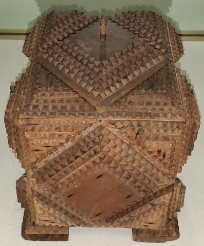 CARVED TRAMP ART BOX: With removable lid, approximate height 8 1/2", width 7 1/2, depth 6 1/2".