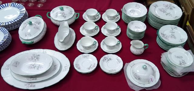 SET OF CZECHOSLOVAKIAN DINNERWARE: With floral decoration, 11 dinner plates, 9 soup bowls, 11 bread plates, 11 salad plates, 4 coffee cups, 10 saucers, covered butter, covered 2-handled bowl, sauceboat with underdish, oval bowl, covere