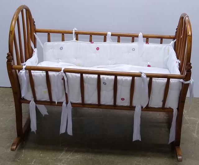 COUNTRY STYLE CRADLE: With bentwood headboard and footboard.