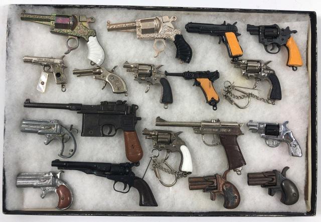 GROUP OF MINIATURE GUNS: Including Mauser, revolvers, pistols and Derringers, 15 of 18 mechanically working, (What I mean by mechanically working is when the hammer is pulled back the trigger will release it. Or there is leve
