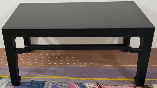 PAUL M. JONES CUSTOM MADE COFFEE TABLE: In modified Chinese design, linen wrapped, approximate height 17 3/4", width 36", depth 20".