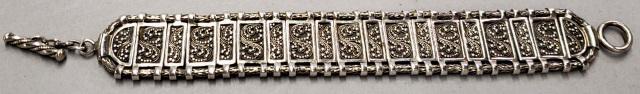 STERLING BRACELET: Sterling silver bracelet, having beaded and scroll design, marked 925, approximate length 6", total length with clasps 7 1/2"", approximate total weight 1.73 ozt.