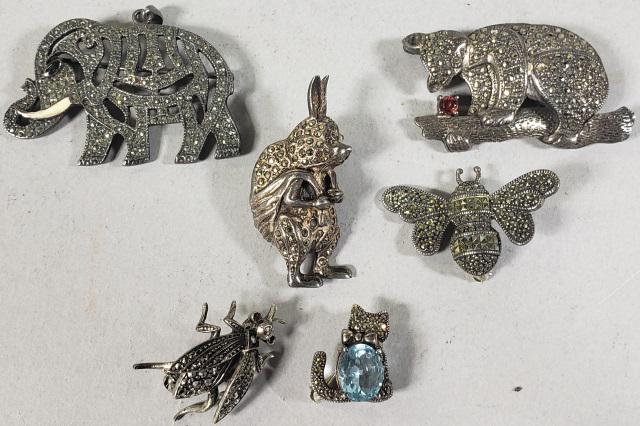 6 PIECES OF STERLING SILVER: Marcasite jewelry, 2 marked Sterling J.J., 3 marked 925, and one marked Sterling Silver Germany.