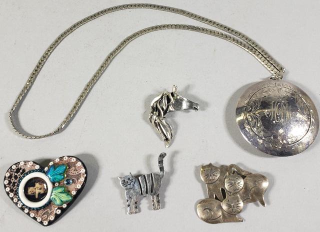 GROUP: 3 sterling silver pins, sterling silver compact marked CB&H Sterling, and a heart pin.
