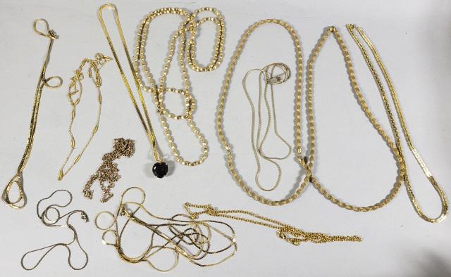 11 NECKLACES: Gold colored, including Joan Rivers, etc.