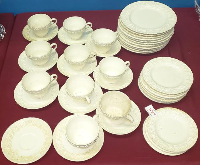 GROUP OF WEDGWOOD DINNERWARE: Queensware, teapot, 11 desert plates, 7 bread plates , 3 small plates, 10 cups, 11 saucers.