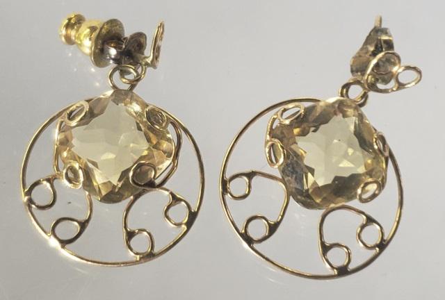 PAIR OF 14K GOLD EARRINGS: Pair of 14k yellow gold earrings, each with amber colored stone, tests 14k, approximate total weight 2.2 dwt.