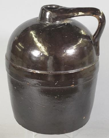RED WING STONEWARE JUG: With dark brown color.