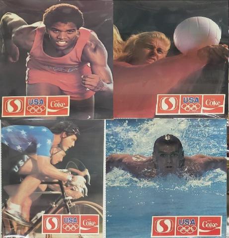 4 OLYMPIC ADVERTISING POSTERS: For Coca-Cola, Swimming, Track, Volleyball and Bicycling, in plastic.