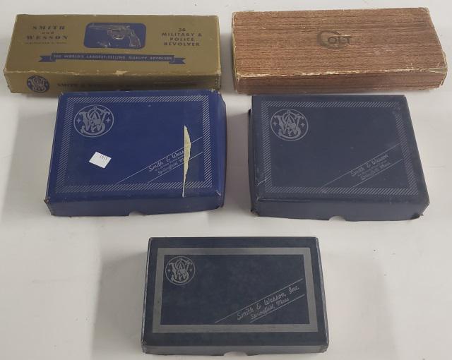 5 GUN BOXES: Including Colt and Smith & Wesson.