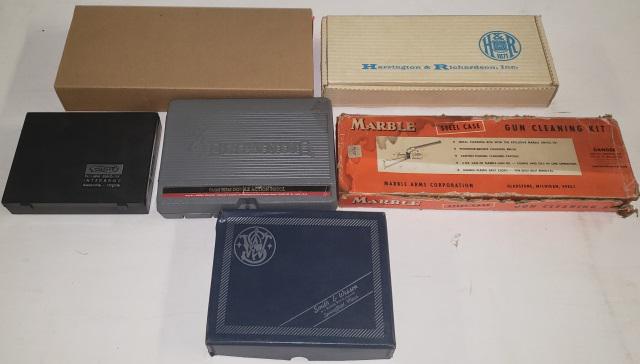 5 GUN BOXES: Including H&R, Ruger, Smith & Wesson, Walther, and Browning (with 1 magazine0 along with a gun cleaning kit box, (boxes only No Guns).