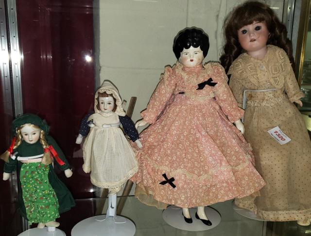 GROUP OF 4 DOLLS: Including Armand Marseille bisque head doll, having set eyes, with open mouth and teeth, leather body with composition hands, marked on back, 370, A.M., 16" along with 3 other vintage dolls.