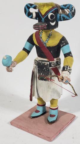 KACHINA DOLL: Kachina doll holding rattle and bow, approximate height 11 7/8".