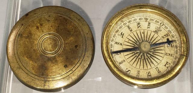 19TH CENTURY COMPASS: Circa 1860, brass pocket compass, screw on lid, paper face, black hand. Deaccessioned from a Midwestern Museum.