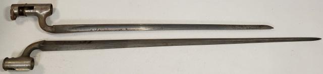 2 BRITISH BAYONETS: 1-Circa 1861, British Enfield bayonet, Civil War era. Triangular socket bayonet for M1853 rifle. Initials "J.T." engraved on it, 2-British bayonet, Civil War era. Triangular socket bayonet. Socket cut