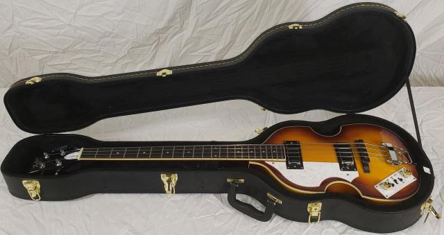 HOFNER IGNITION VIOLIN BASS: Hofner ignition violin bass, left handed, comes with case, strap and Samsung CT20 guitar tuner.