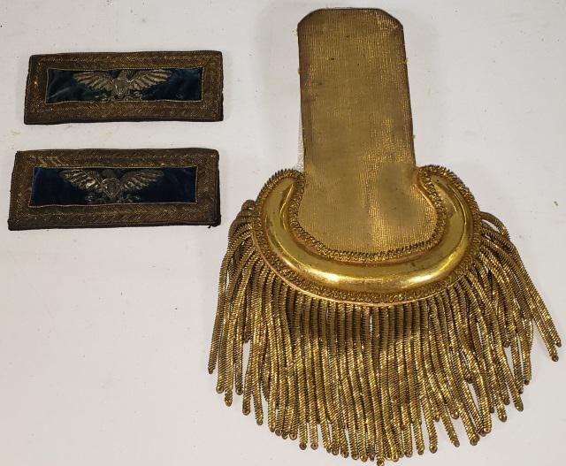 PAIR OF SHOULDER INSIGNIA & AN EPAULET: Circa 1862 - Pair Colonel?s shoulder insignia, General Staff Corps, spread eagle in silver wire sequins on dark blue velvet; gold wire border. [Good - silver and gold have a darkened patina] 726.436 ?