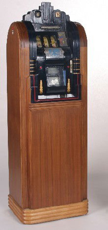 MILLS FLOOR MODEL FIVE CENT SLOT MACHINE| Having: MILLS FLOOR MODEL FIVE CENT SLOT MACHINE| Having mahogany finish, height 60'', width 21'', depth 14 1/2''. CONDITION: Good, mechanism needs lube.