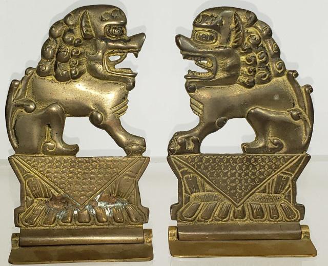 2 BRASS BOOKENDS: Lions, each marked "Hong Kong", approximate height of each 6".
