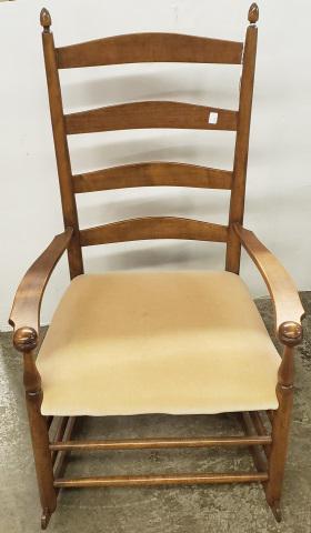 SHAKER ROCKER: Having peach upholstered seat.