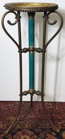 BRASS AND PORCELAIN PLANT STAND: Having 3 legs, with porcelain center column with gilt highlights, approximate height 33 1/2".